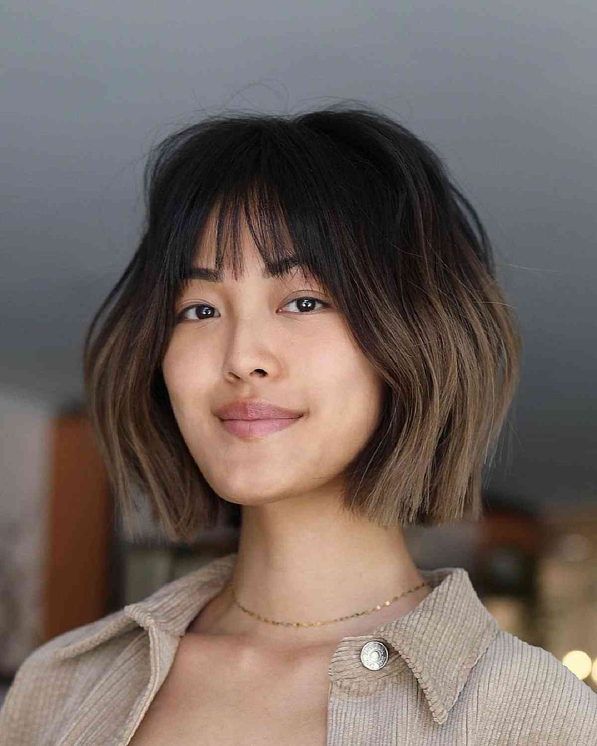 Short Neck-Length Blunt Cut with Wispy Light Bangs