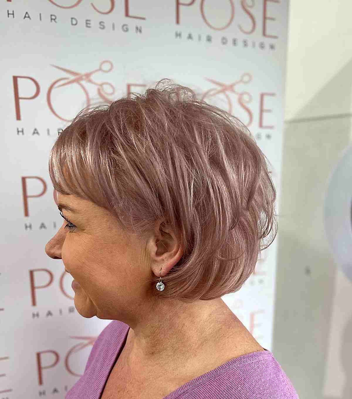 Short Pastel Hair with Feathered Layers and a Wispy Fringe for Old Ladies