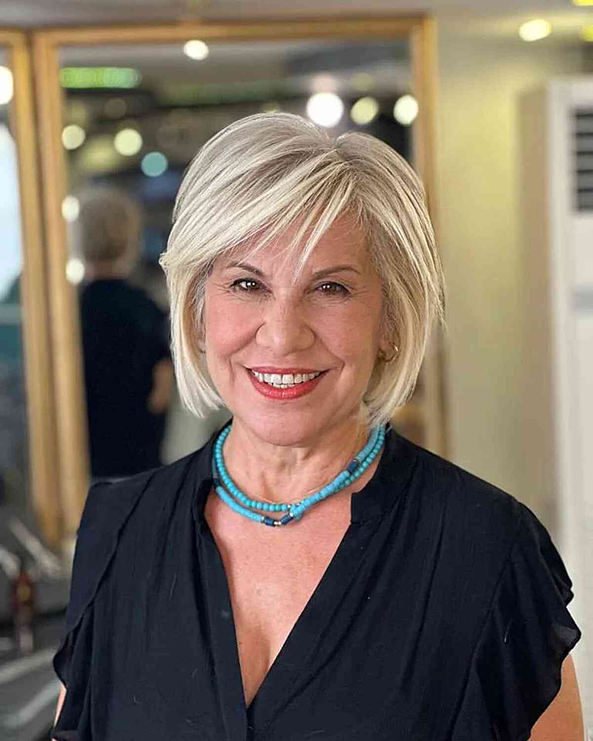 Short Piecey Blonde Side-Parted Bob Hairstyle for 60-year-olds