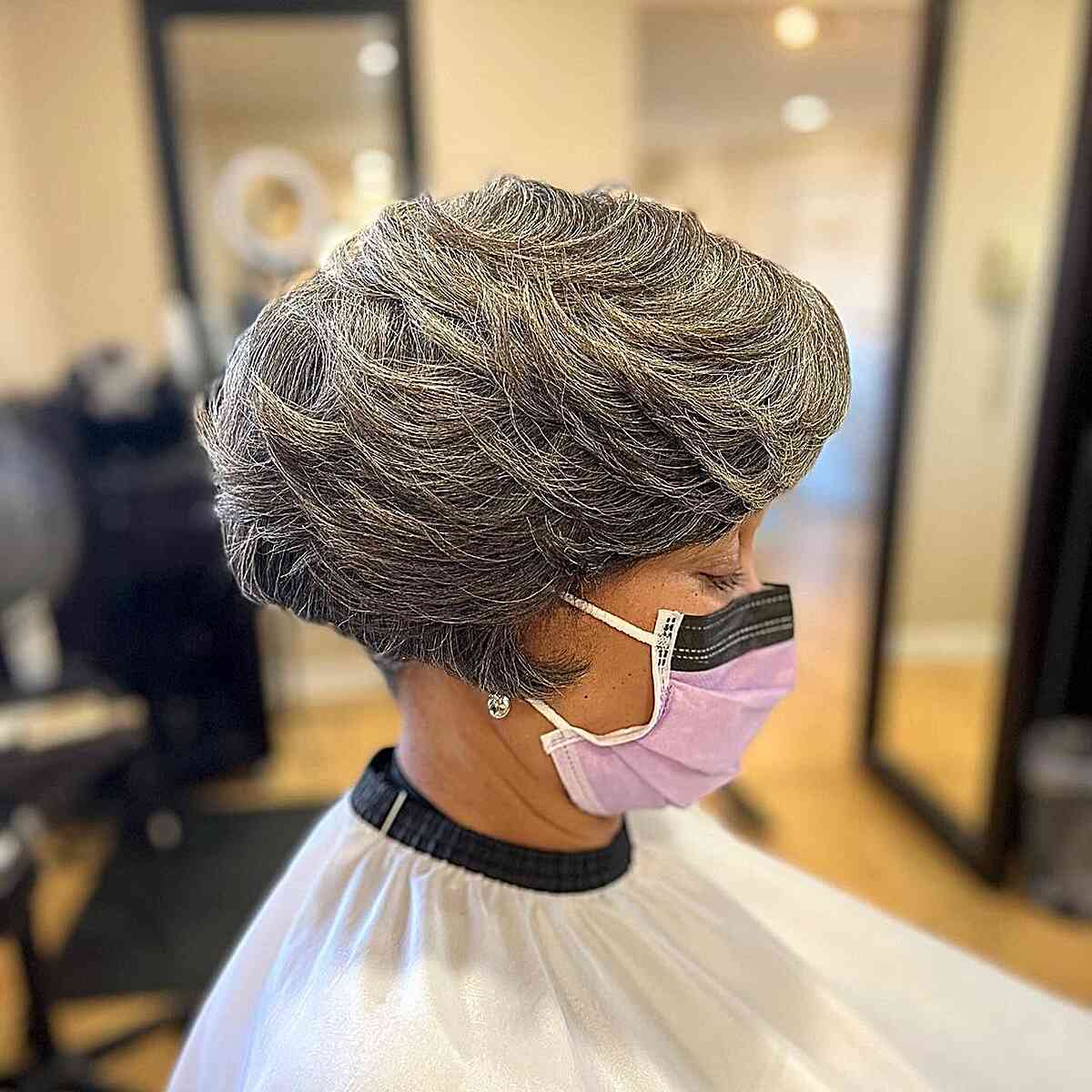 Short Pixie Bob with Feathery Flipped-Up Layers for Black Mature Ladies