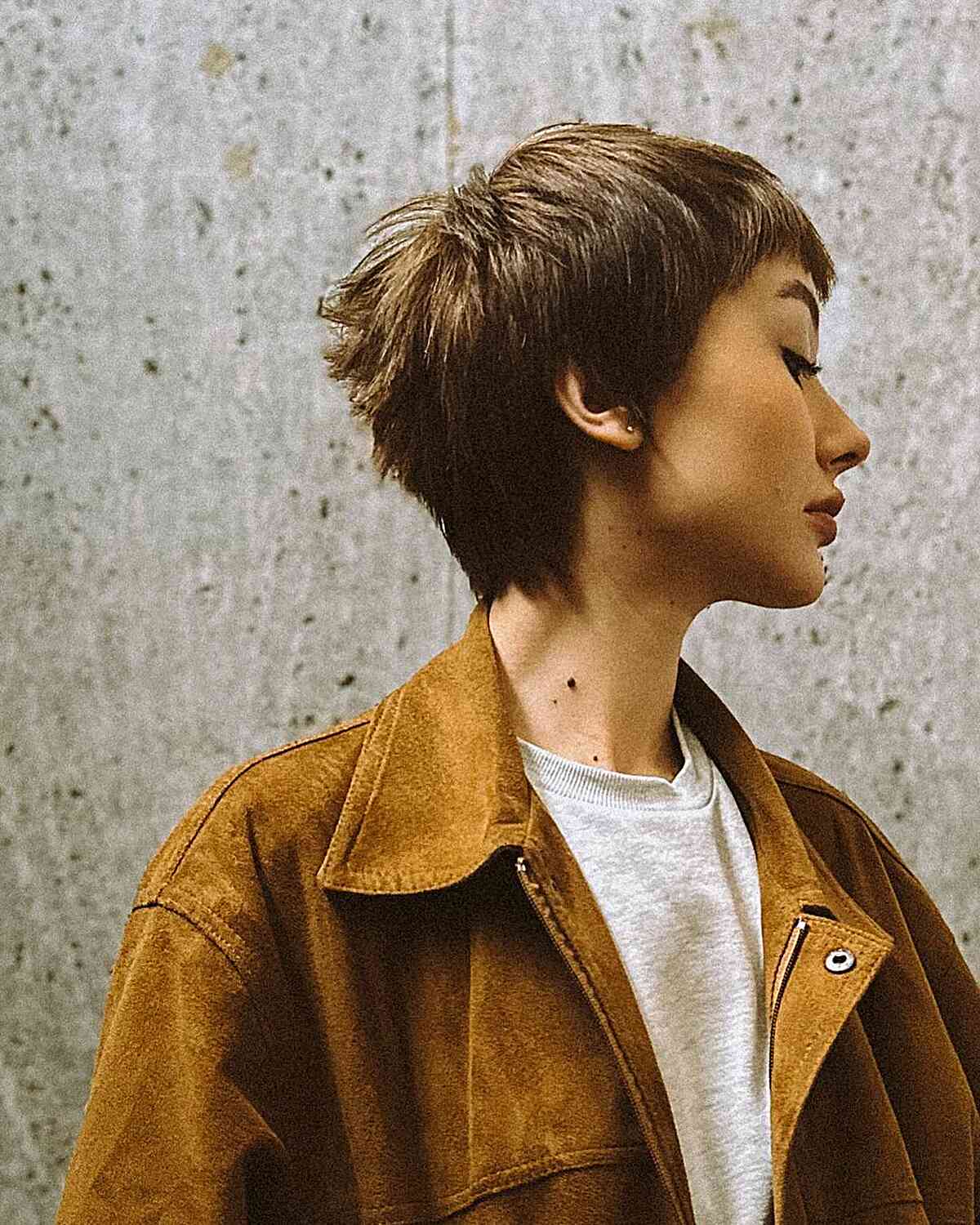 Short Pixie Crop with Textured Bangs on Dense Hair