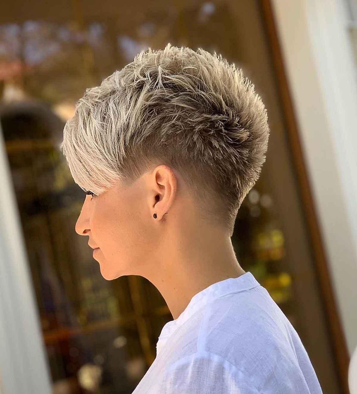 Short Blonde Pixie with Long Bangs