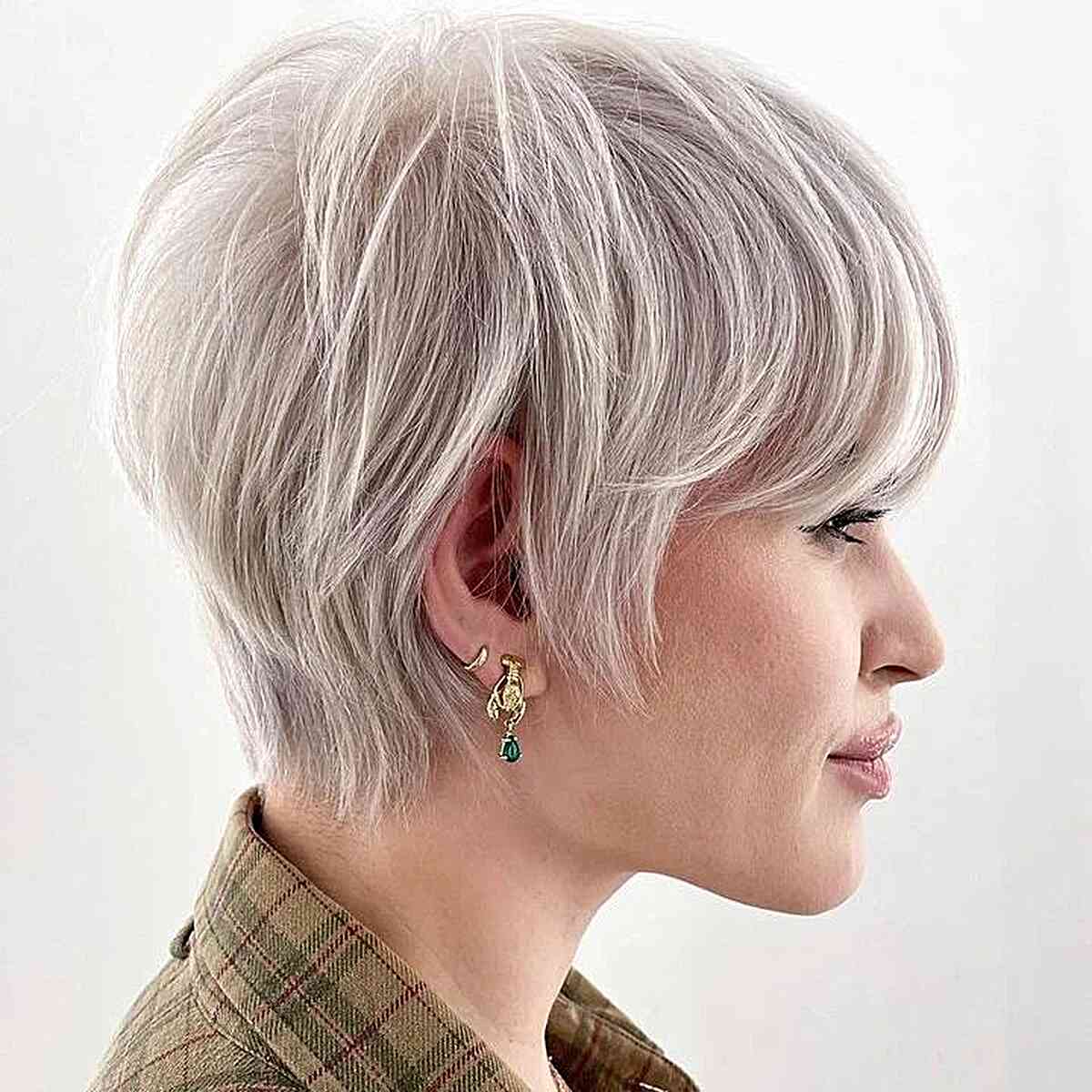Short Platinum-Toned Layered Long Pixie for women with an edgy style