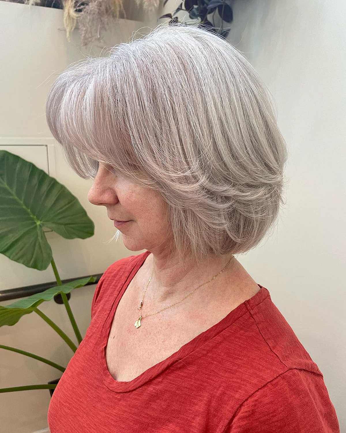 Short Platinum Wispy Bob with Layers and Bangs