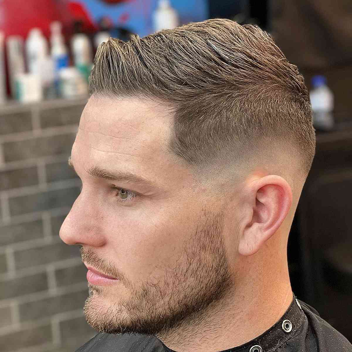 Classic Short Quiff with a Mid Skin Fade for Men