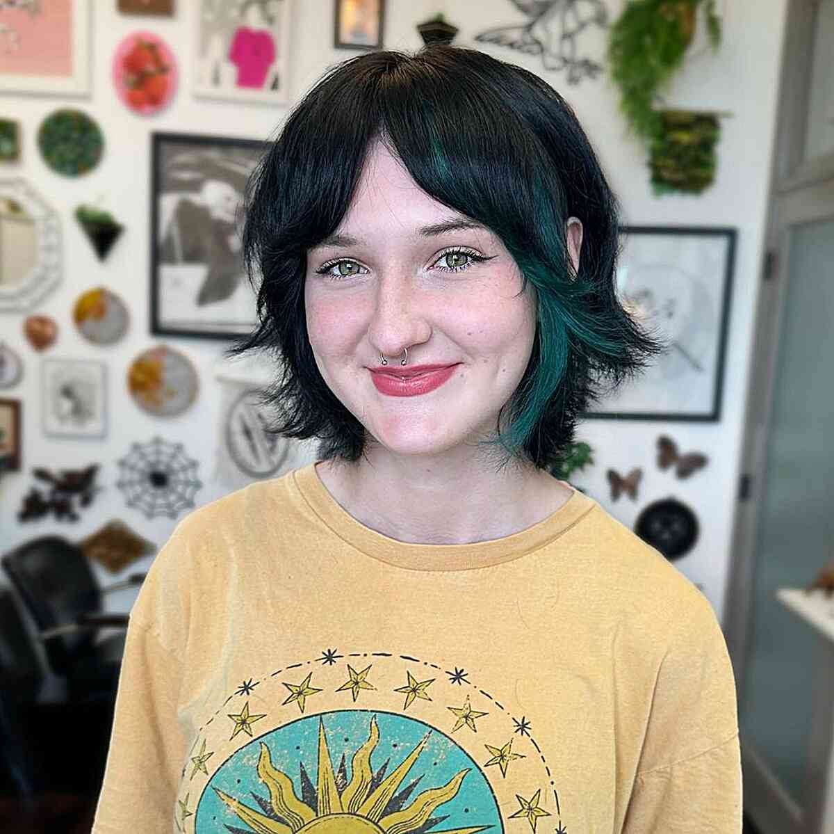 Short Razored Bob with Middle Part Face-Framing Bangs