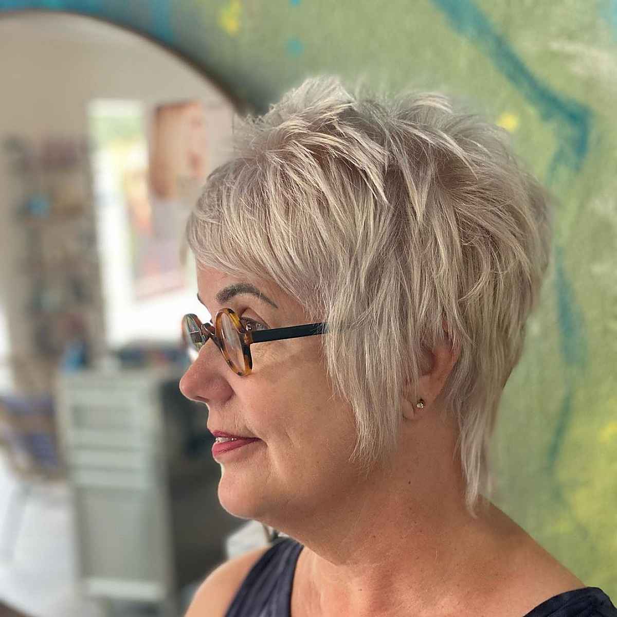 Short Shag for Women Over 60 with Bangs and Glasses