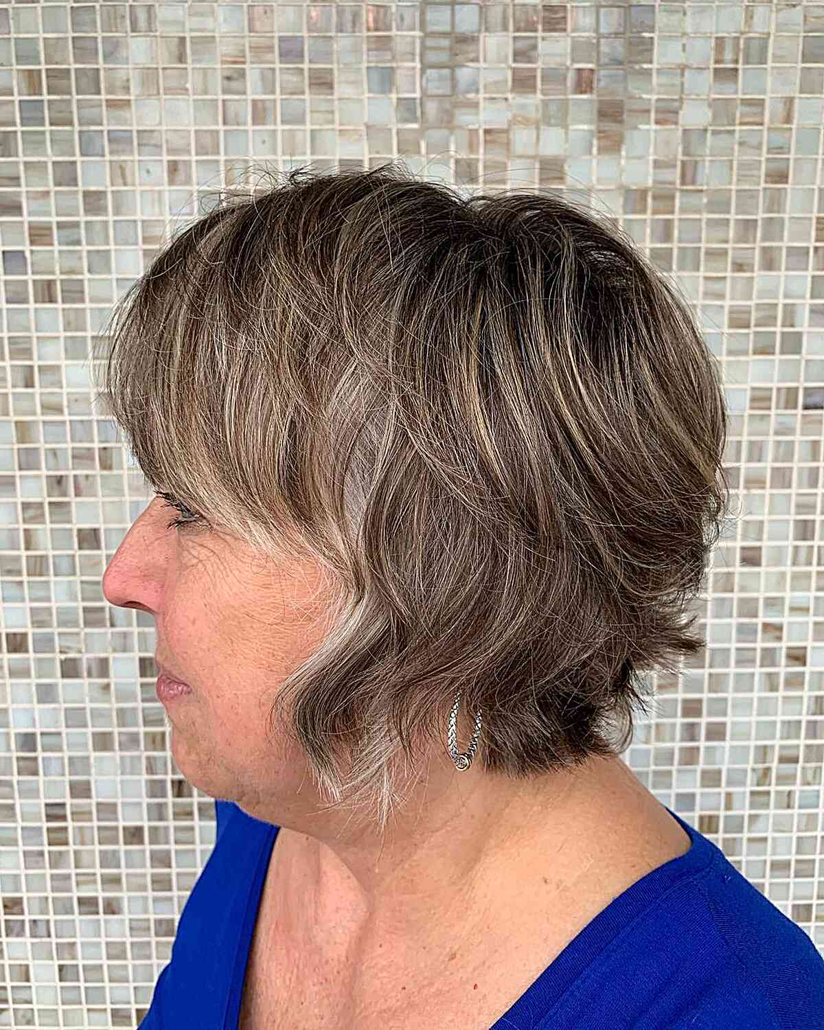 Short Shaggy Bixie with Soft Bangs and Choppy Ends for Older Women with Fuller Faces