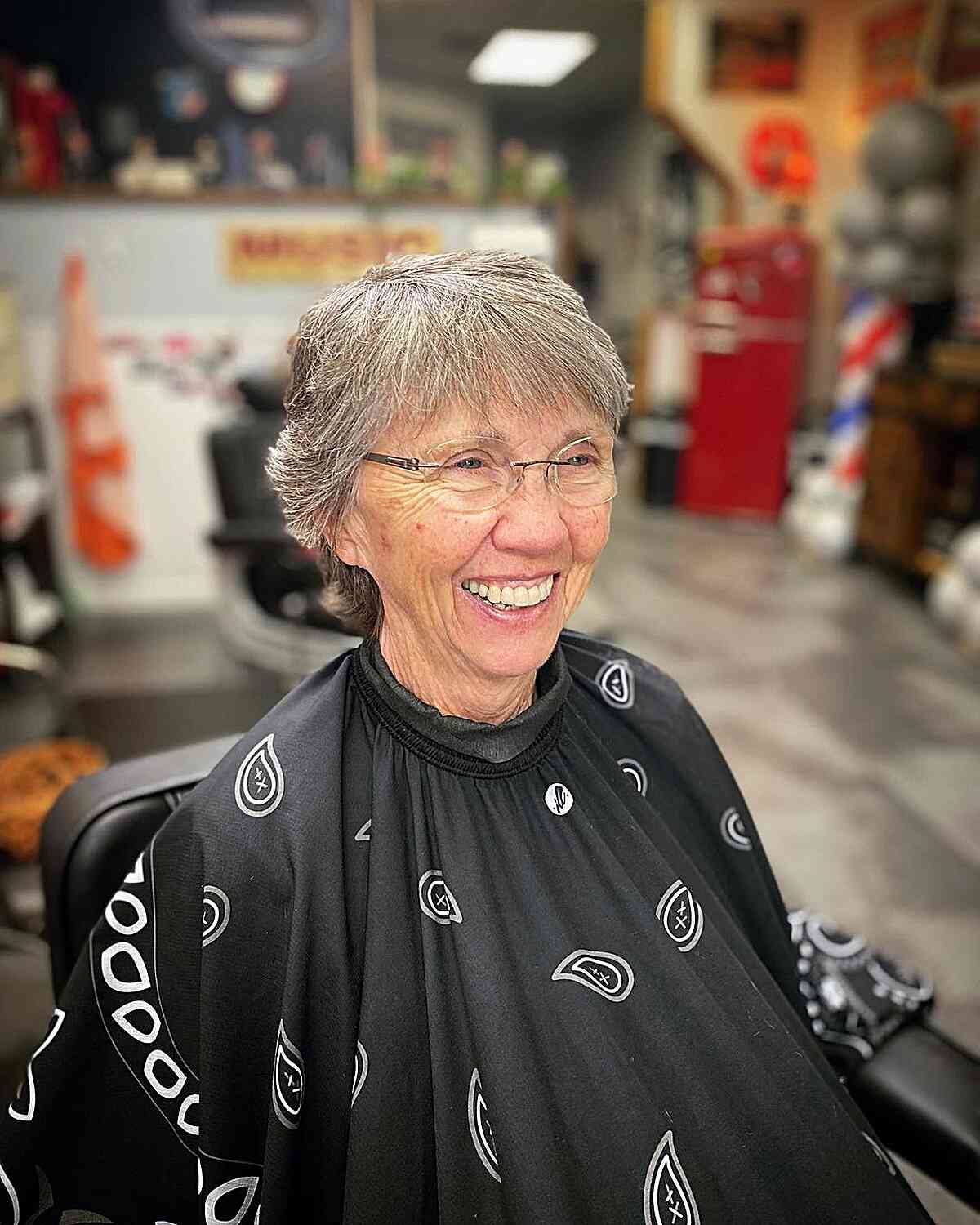Short Shaggy Grey Pixie with Choppy Bangs on Women Over 70 with Glasses