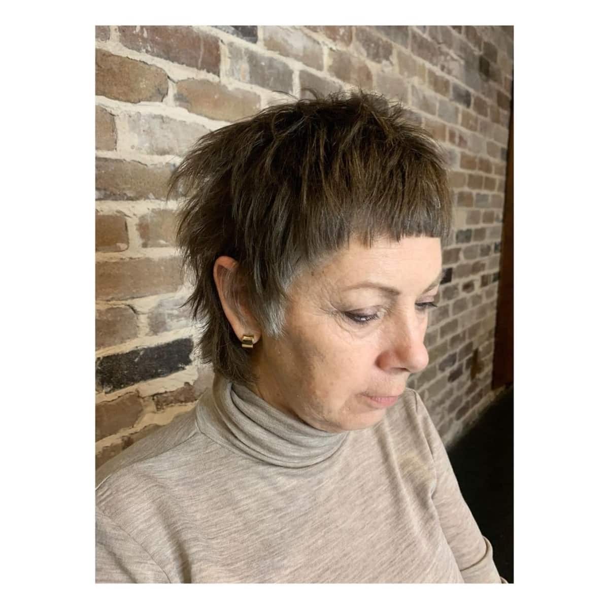 Short Shaggy Haircut with Bangs for 60-year-old women