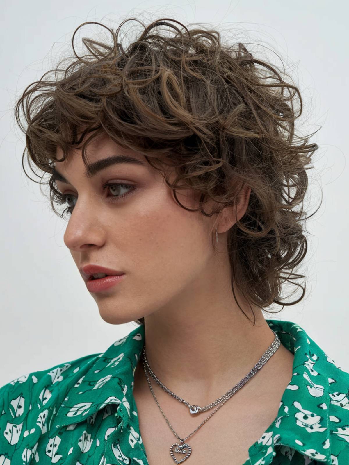 Short shaggy mullet for women with curly hair