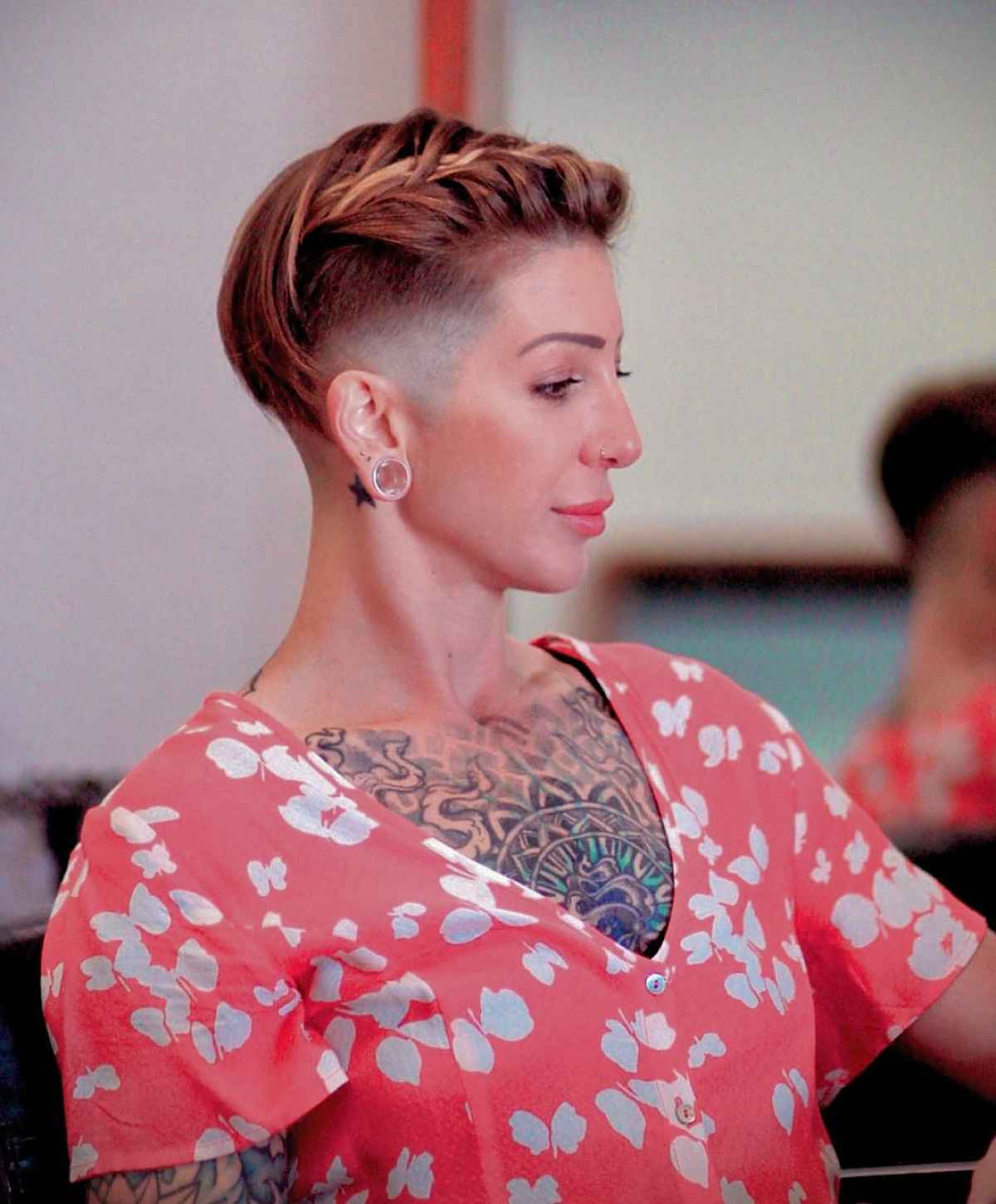 short shaved undercut with a braid