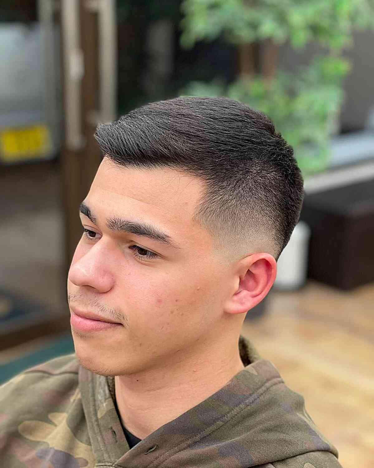 Short Skin Fade Low-Maintenance Cut with Tapered Sides on Young Gentlemen with no Beard