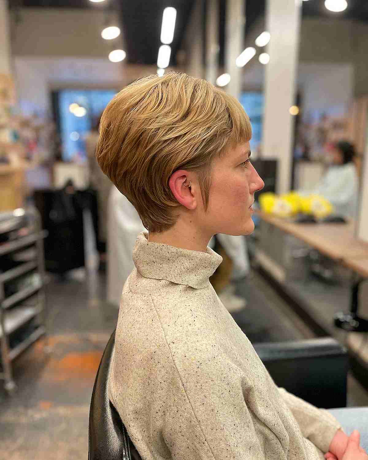 Short Sleek Wavy Pixie with Short Bangs and Layers