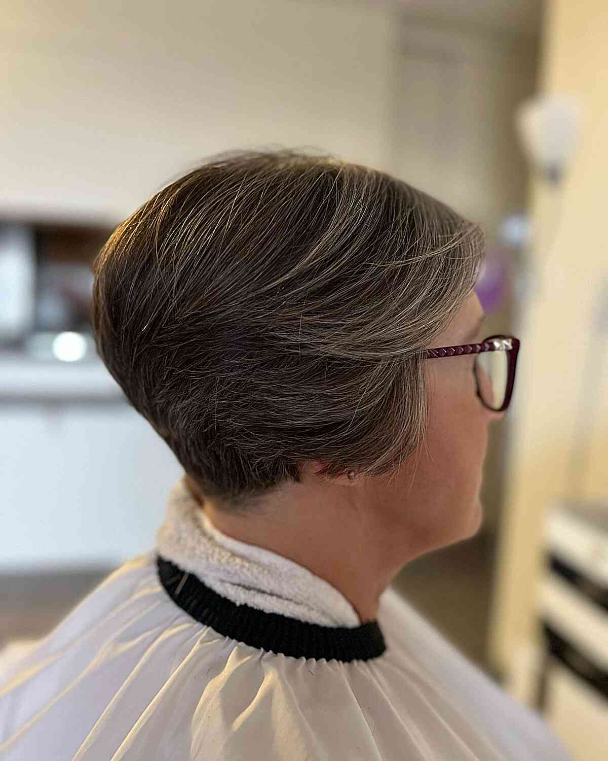 Short Soft Feathered Layered Pixie Cut with Tapered Nape for women aged 60