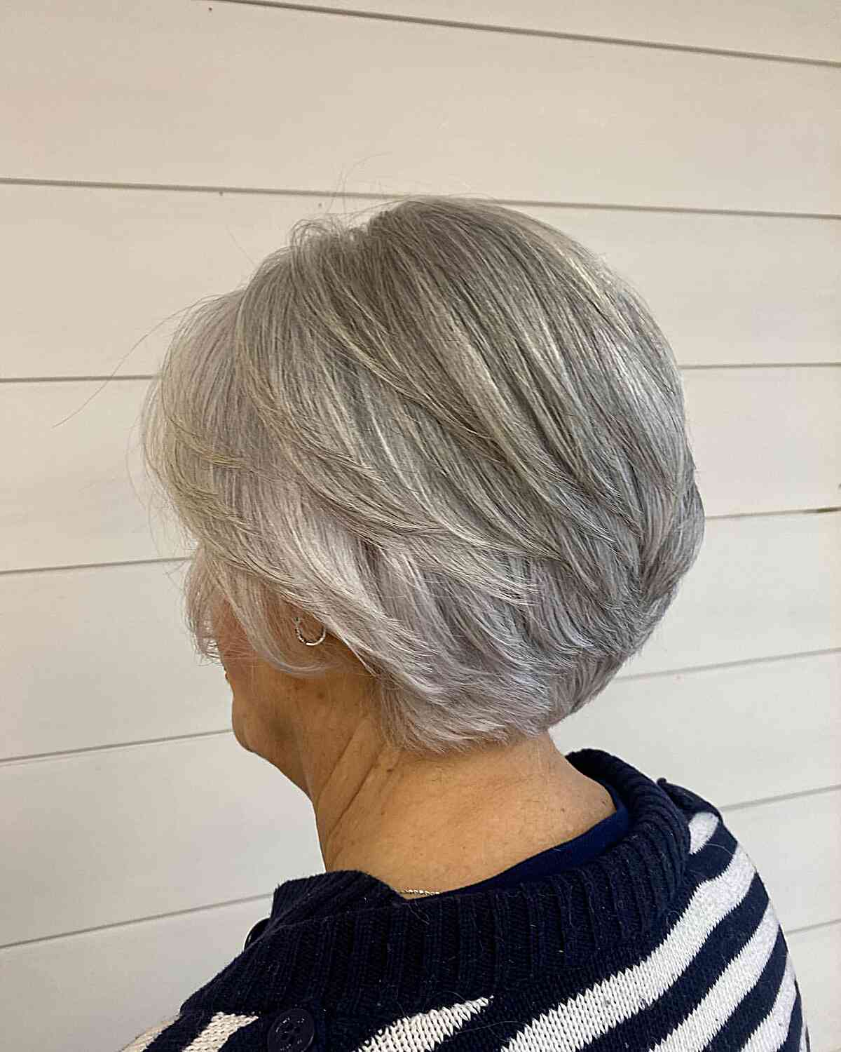 Short Stacked Feathered Bob with Soft Layers on Women Aged 60