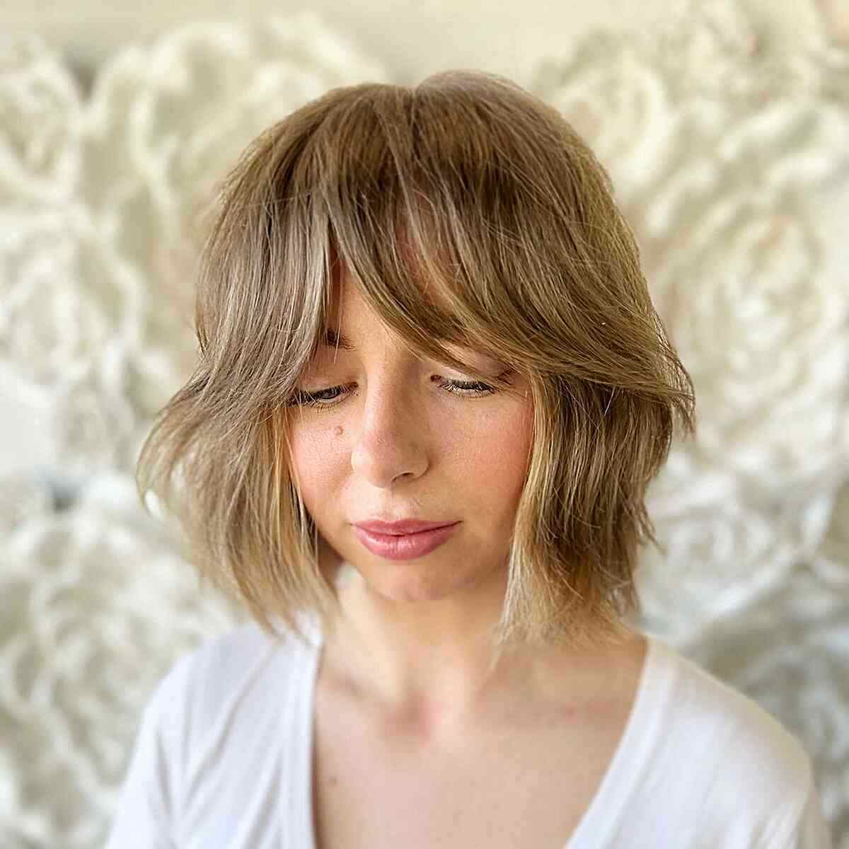 Short Textured Shaggy Bob with Middle-Parted Long Fringe