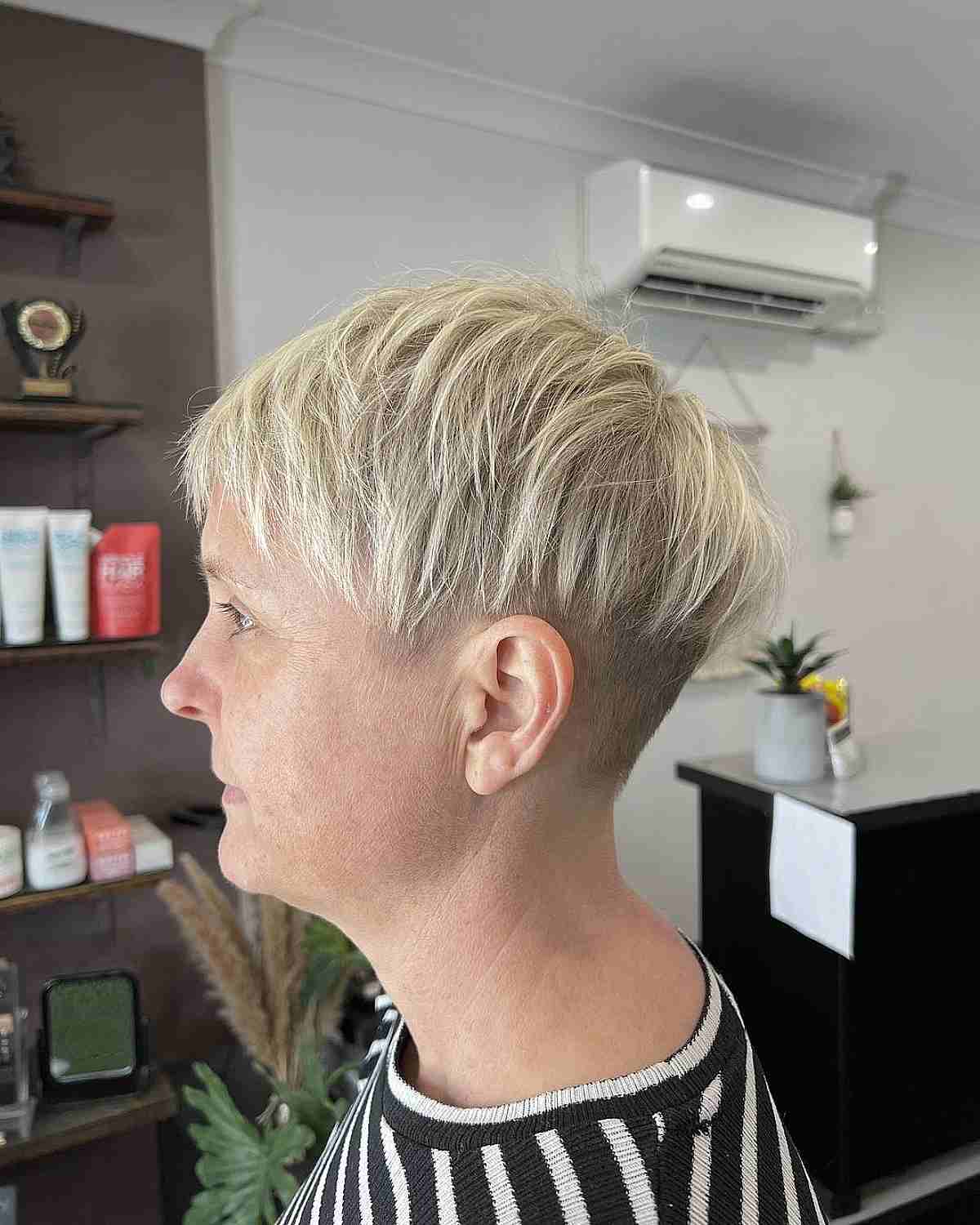 Short Thin Choppy Hair with Shaved Sides and Nape 