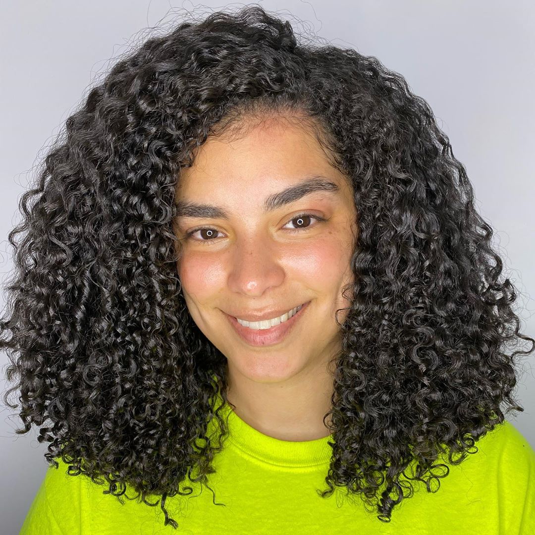 Healthy-looking tight curls on medium hair