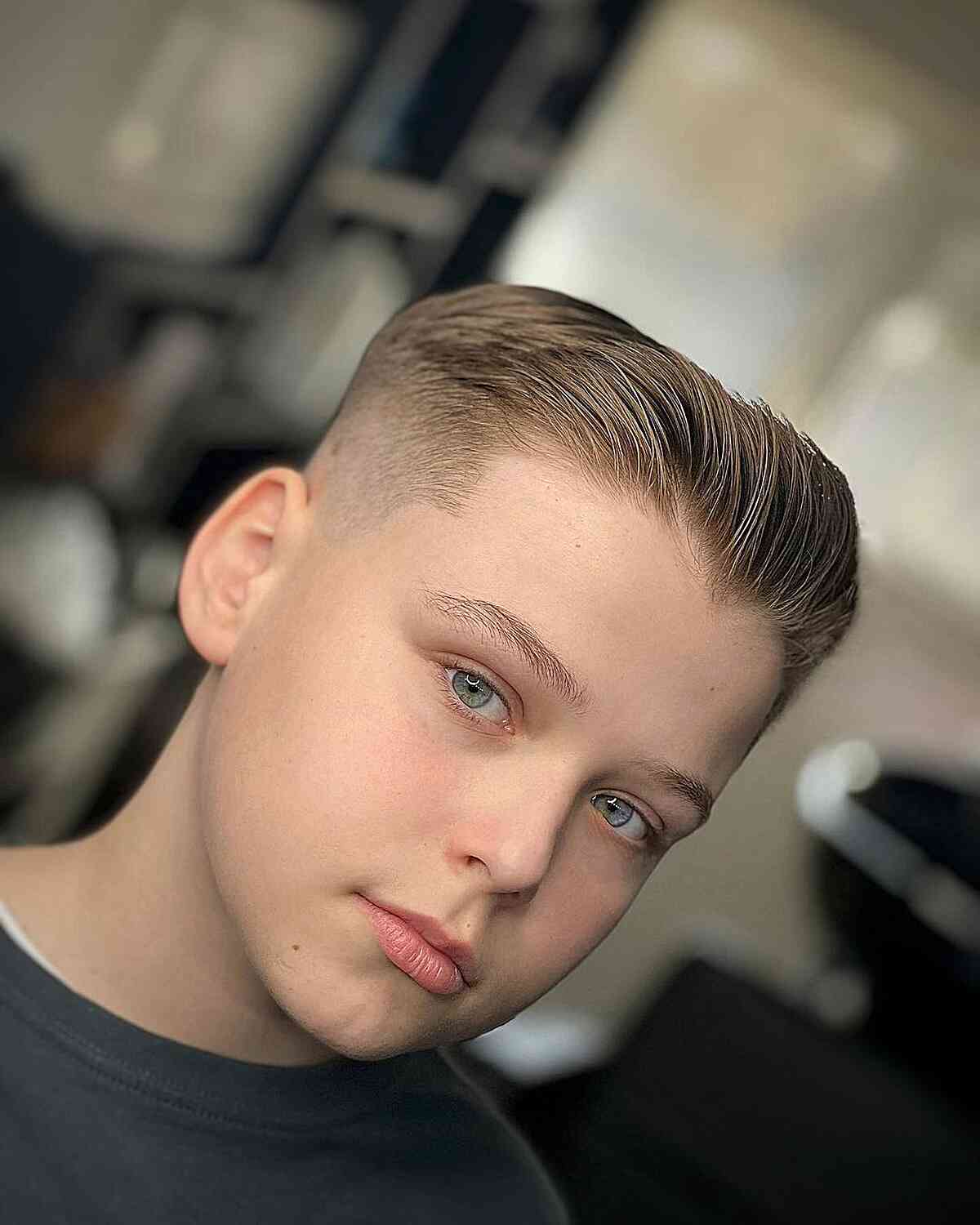 Short Top with Brushed Up Bangs for Teens with a skin fade on the sides