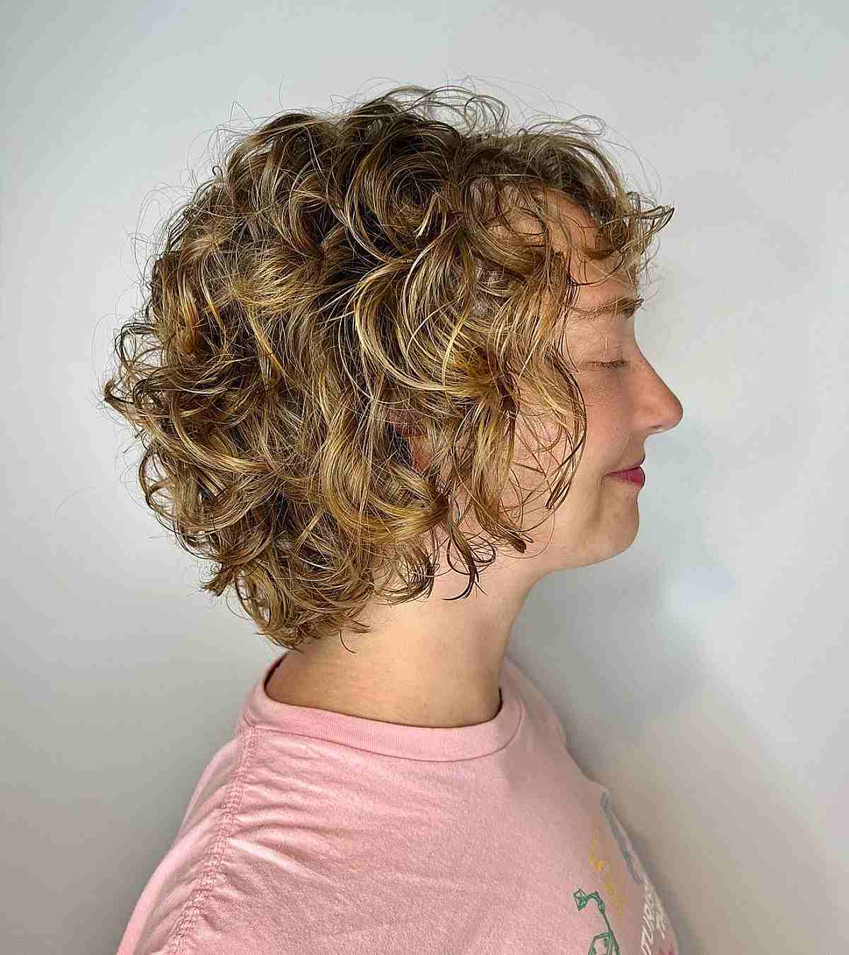Effortless Short Tousled Curls with Subtle Bangs