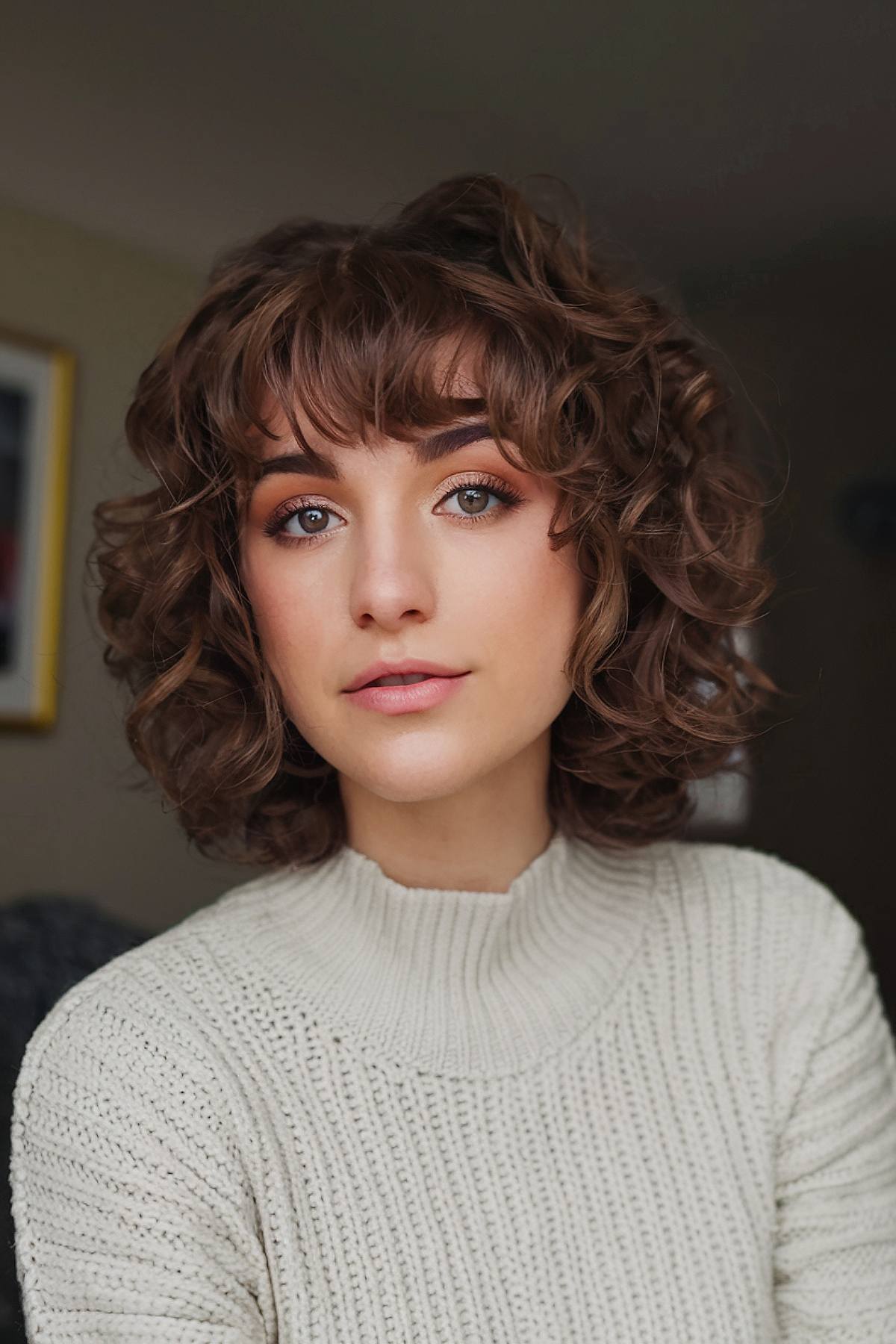 trendy short curly haircut for women