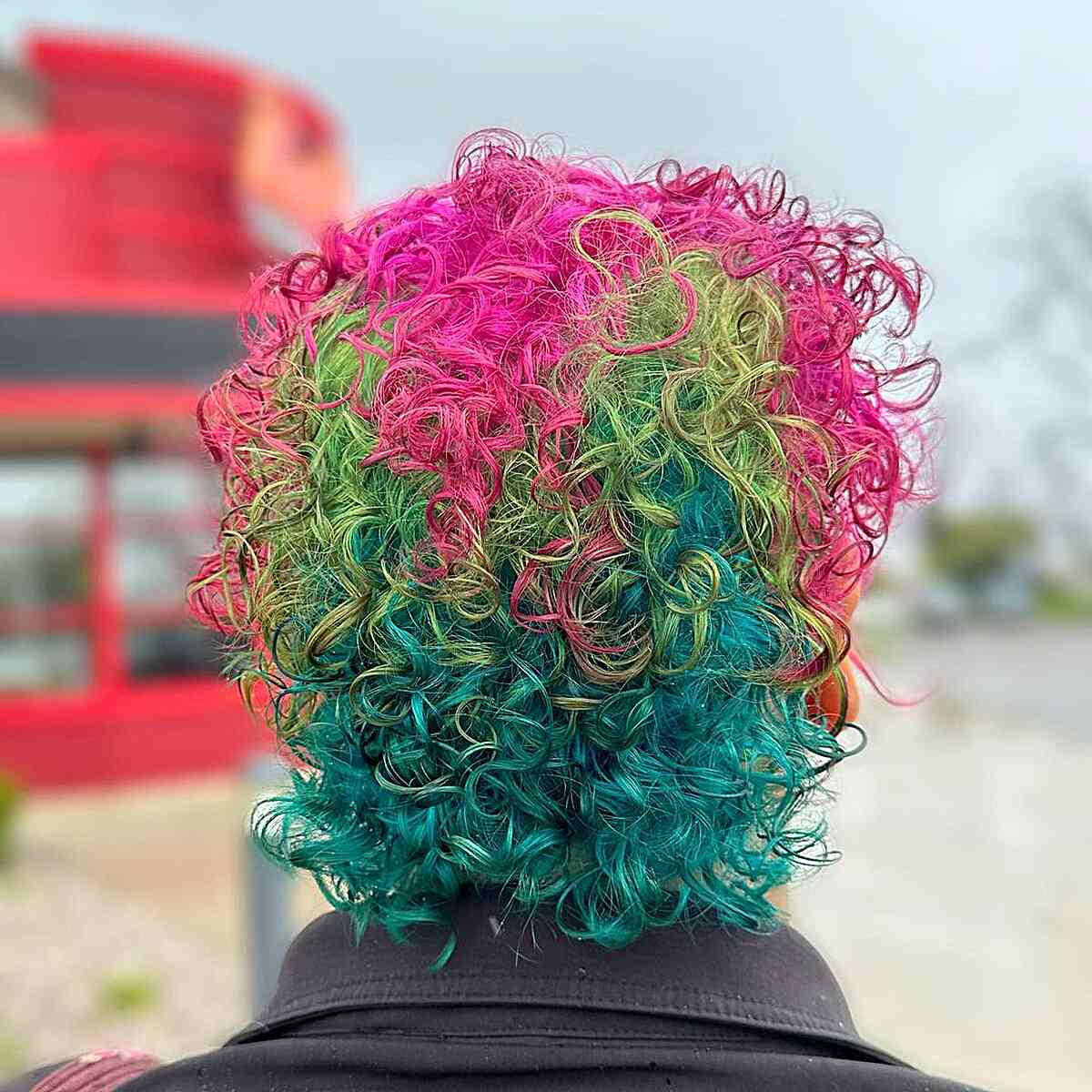 Short Vivid Rainbow Curls Hair Color Ideas