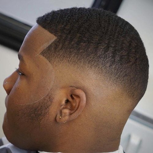Mid Fade Hairstyle for Black Men with Short Waves