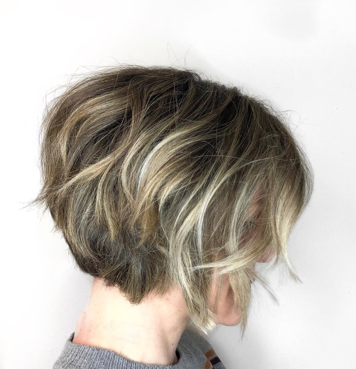 Flattering Short wavy inverted bob for ladies over fifty
