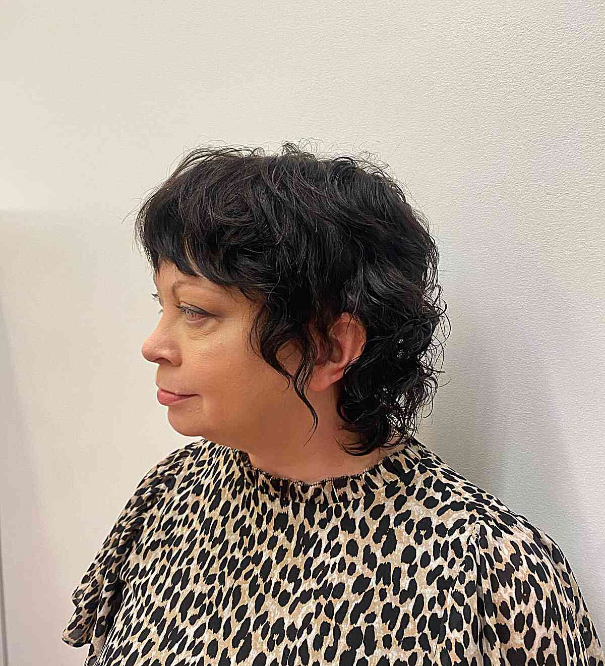 Shorter Long Pixie Wavy Shag with Heavy Bangs for Mature Women