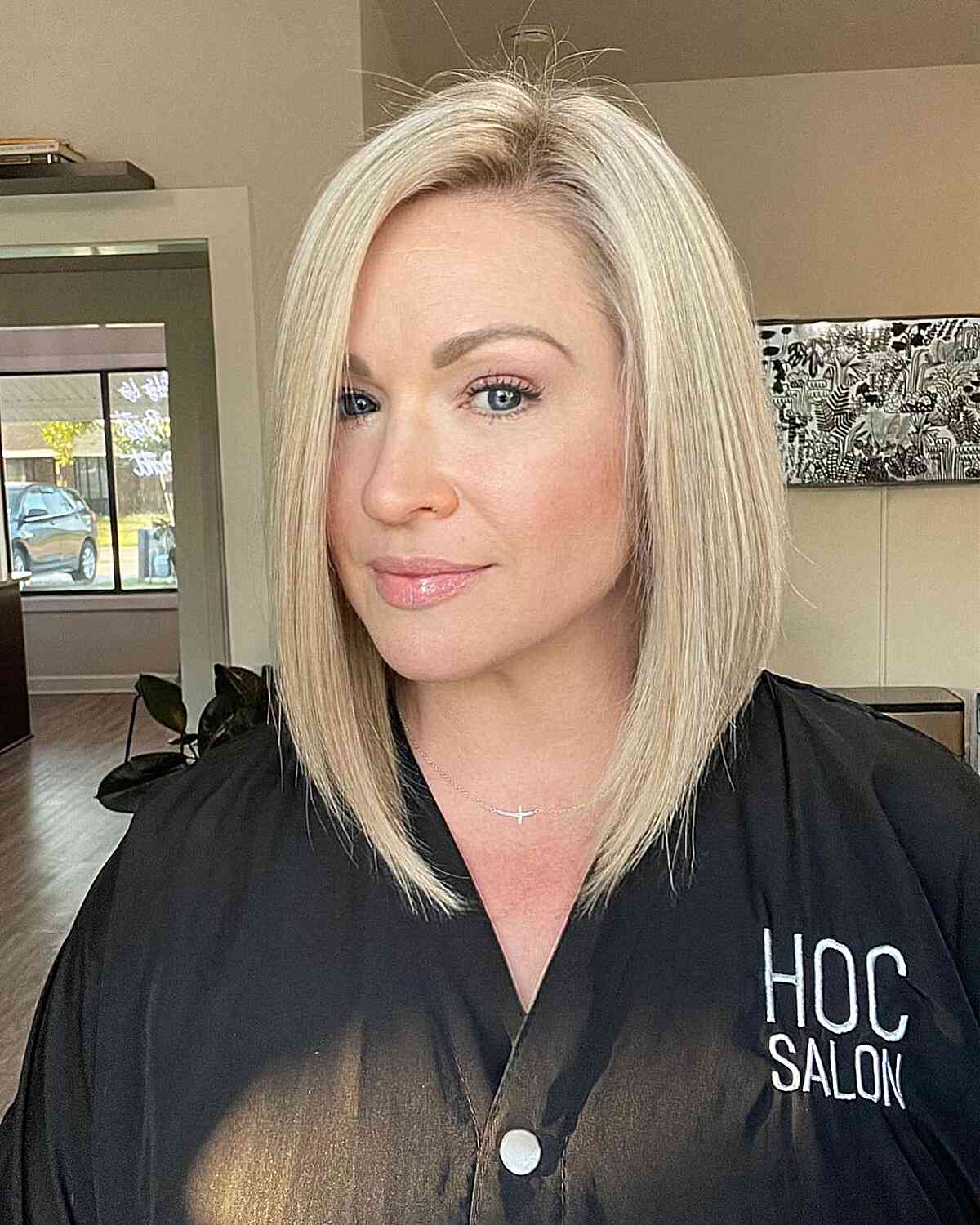 Shoulder-Grazing Bright Blonde Graduated Bob with Side Part