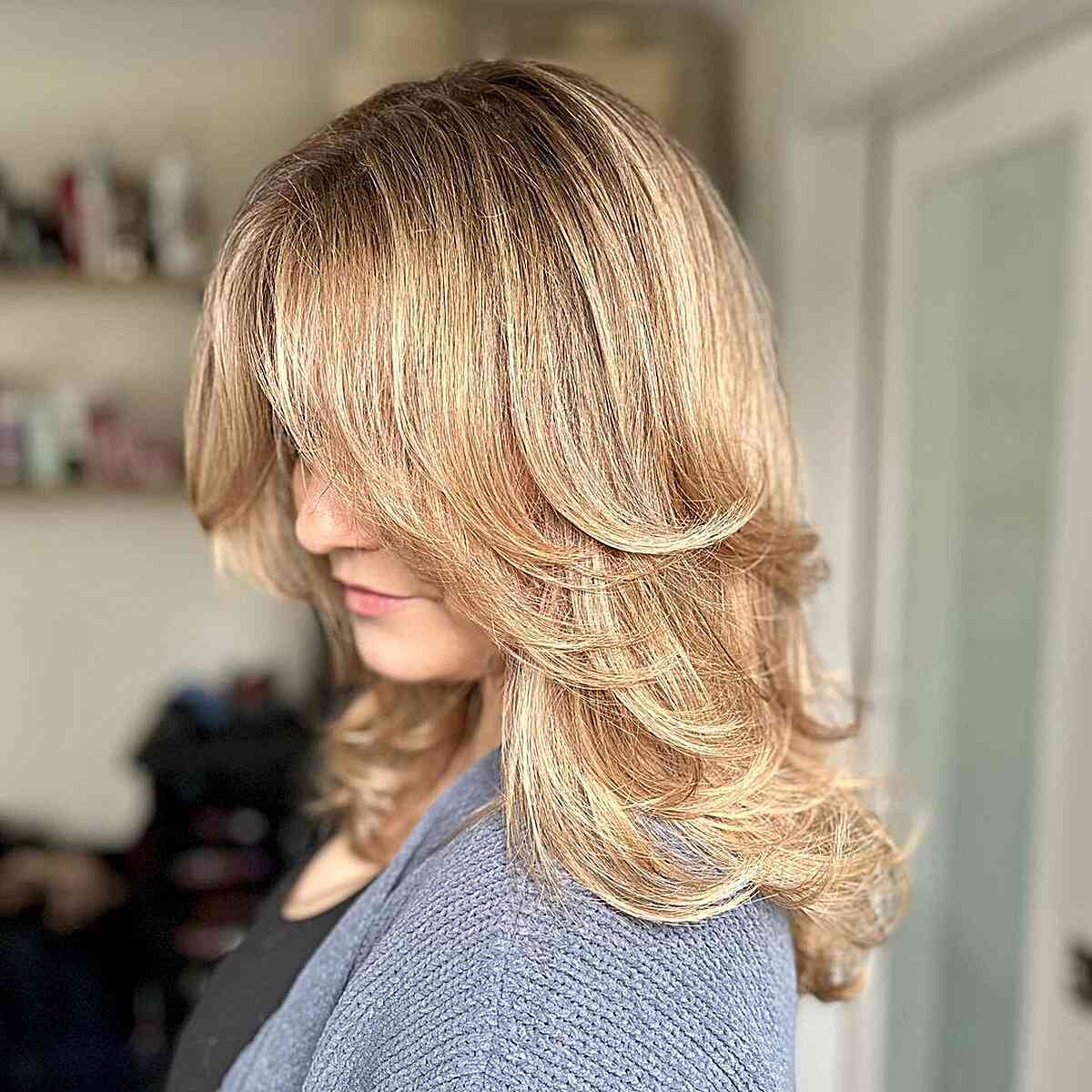 Shoulder-Grazing Feathery Textured Haircut with Blowout
