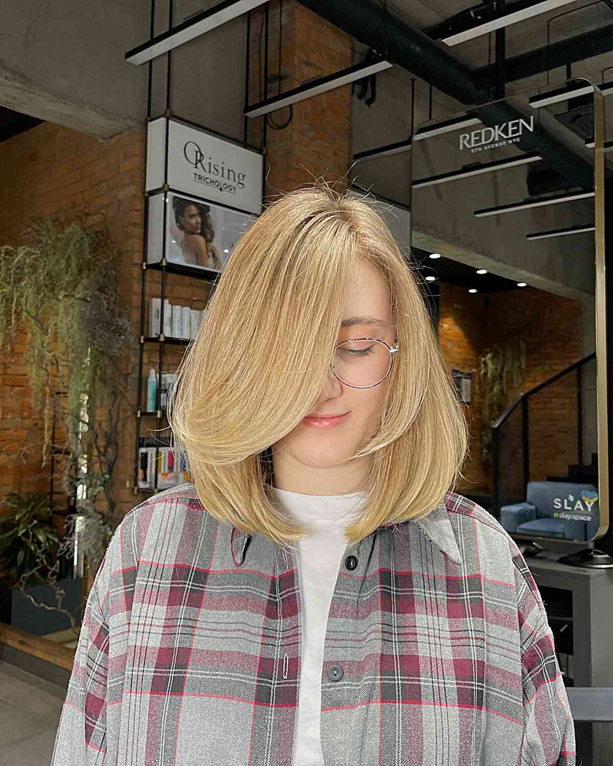 Short Brown Haircut with Choppy Ends for a Square Face
