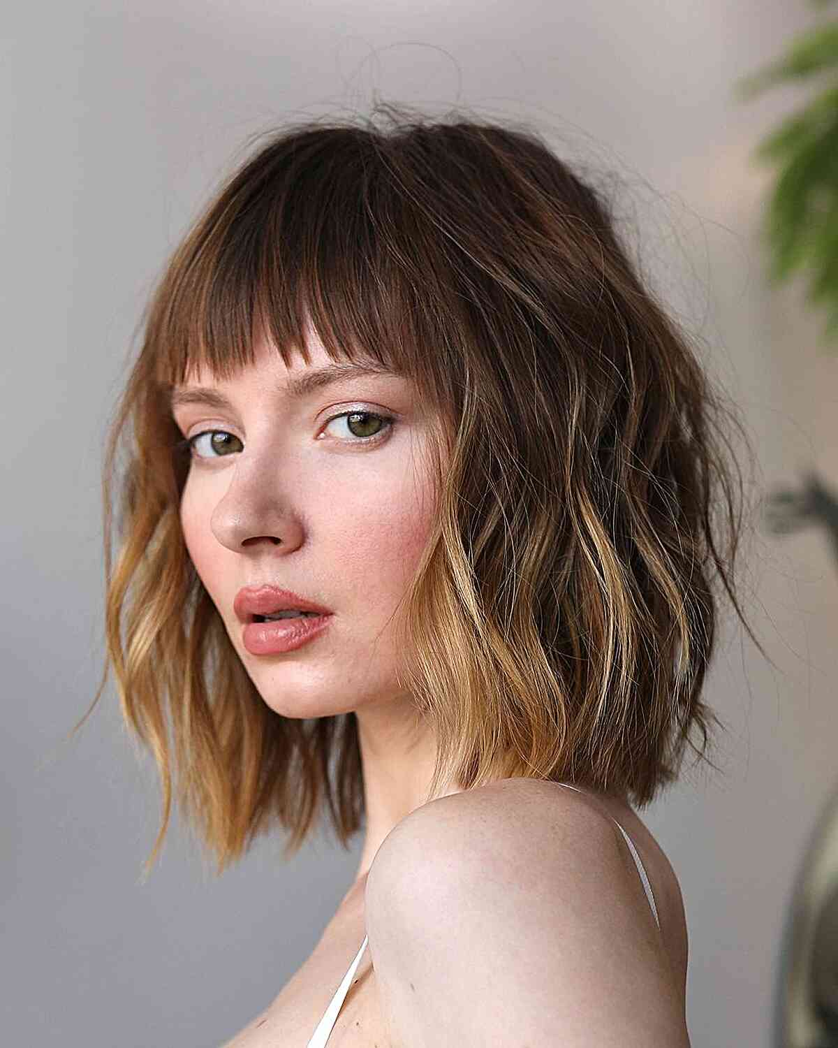 Shoulder-Length Crop with Choppy Shorter Bangs for girls with messy hair