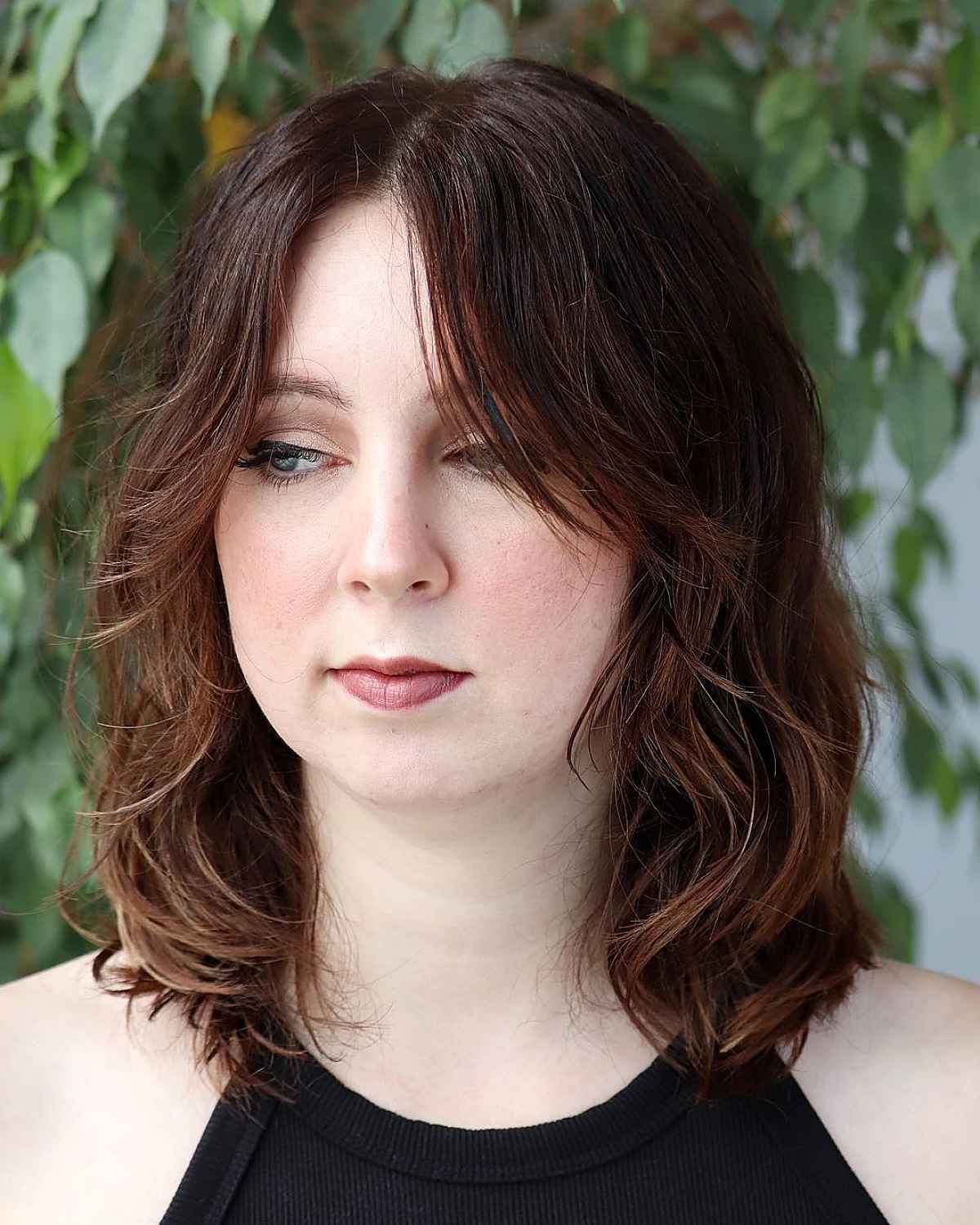 Shoulder-Length Shag with Long Curtain Bangs for Chubby Faces