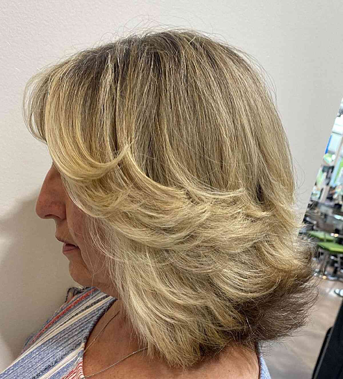 Shoulder-Length Short Layered Blowout Butterfly Style on Thick Blonde Hair