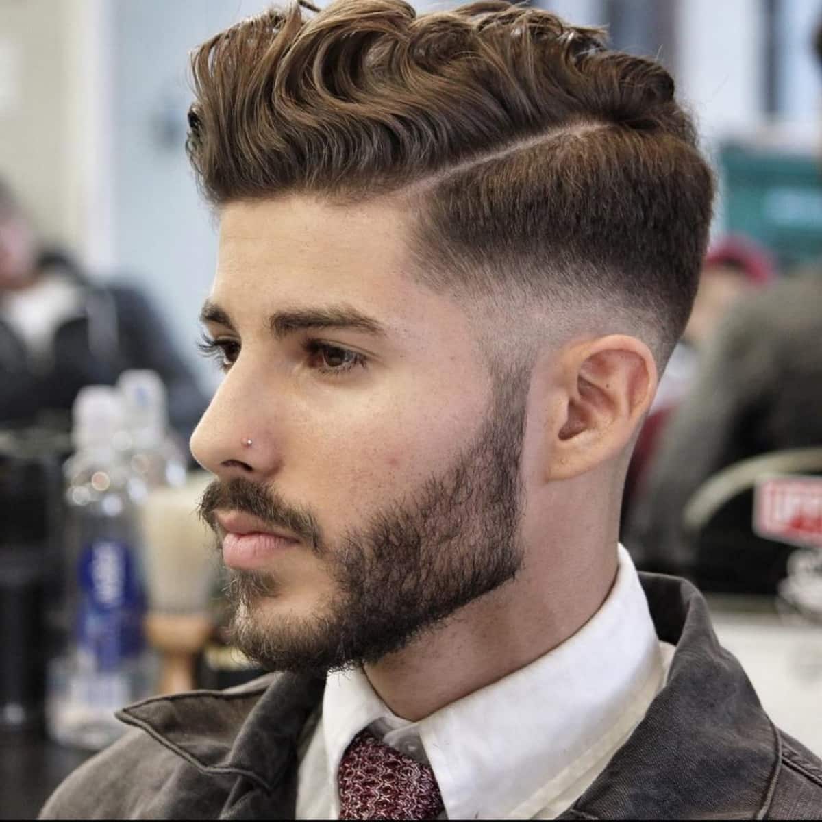 Stylish side part style for men with wavy hair