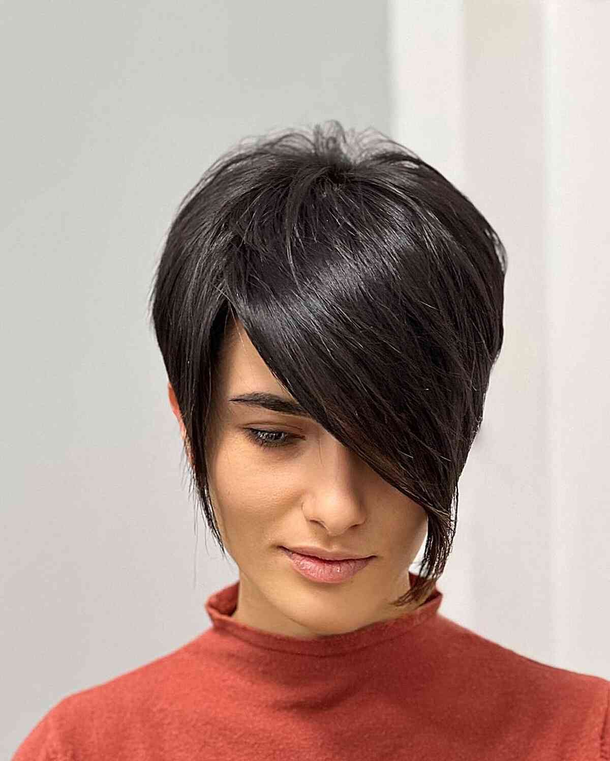 Side-Parted Asymmetric Long Pixie with sweeping bangs