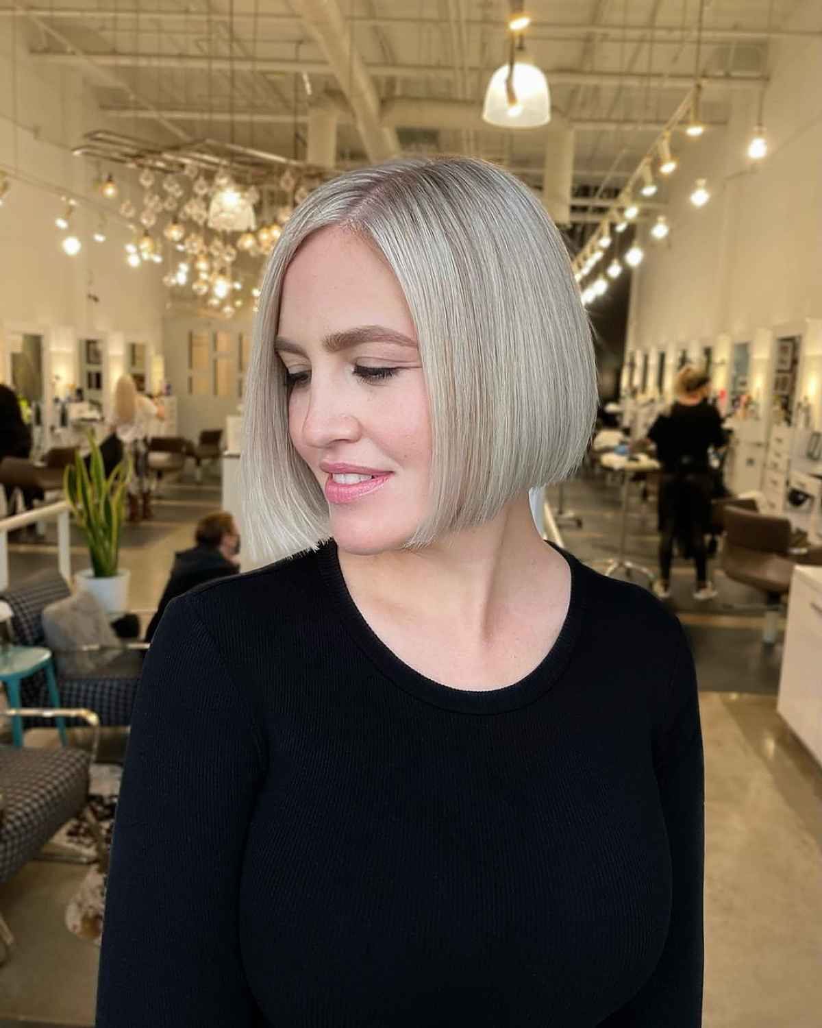 Side-Parted Blunt Cut on Blonde Hair