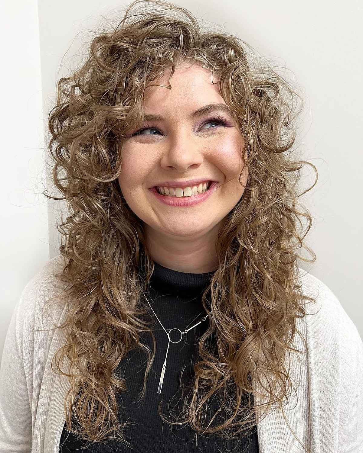 Side-Parted Curls with a Tousled Texture