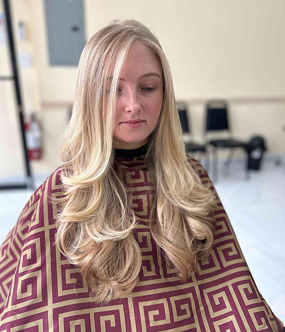 Side-Parted Long Feathered Layers on Blonde Hair