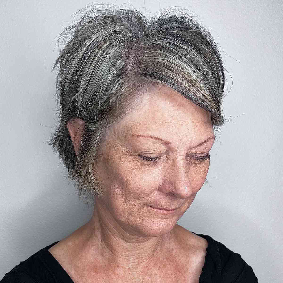 Side-Parted Long Pixie Cut for 50-Year-Olds with Thin Hair