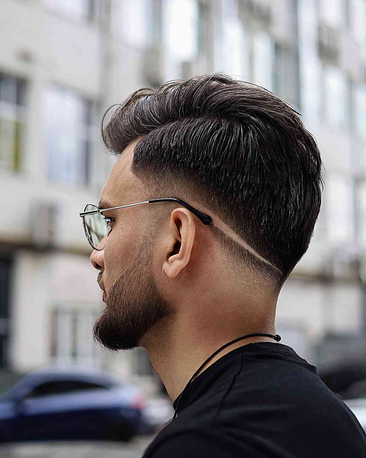 Side-Parted Low Fade Cut for Guys with a beard fade