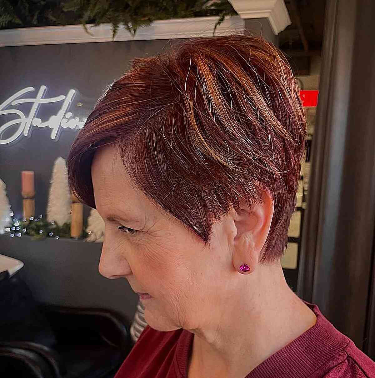 Side-Parted Red Long Pixie with Highlights for Mature Women Over Seventy