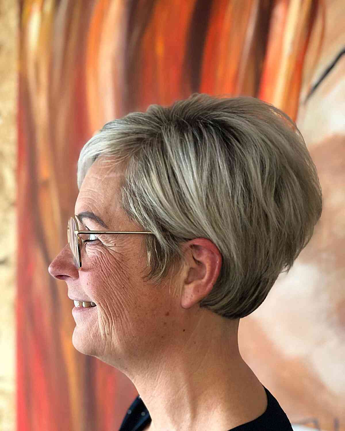 Side-Parted Short Stacked Pixie Cut for Mature women wearing glasses