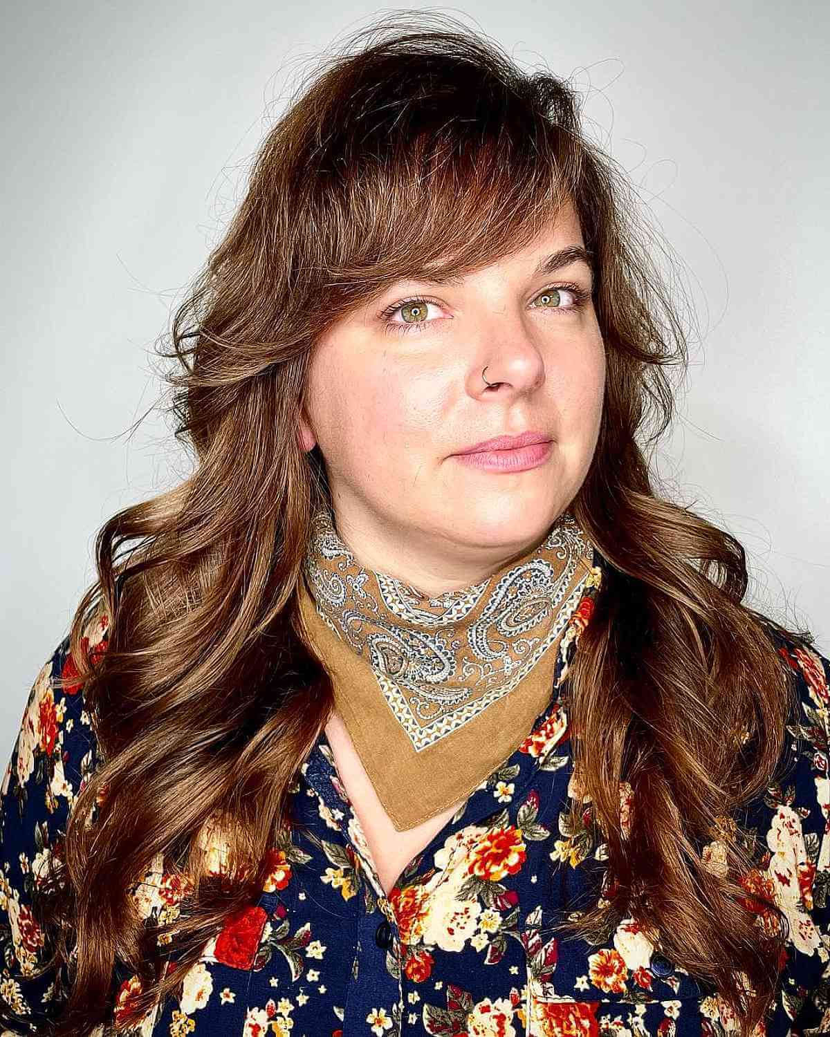 Side-Swept Bangs on Long Hair for Fat Faces in Their Forties