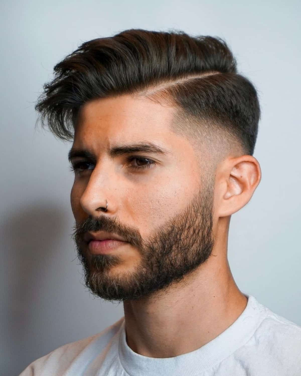 Side-swept hair with drop fade