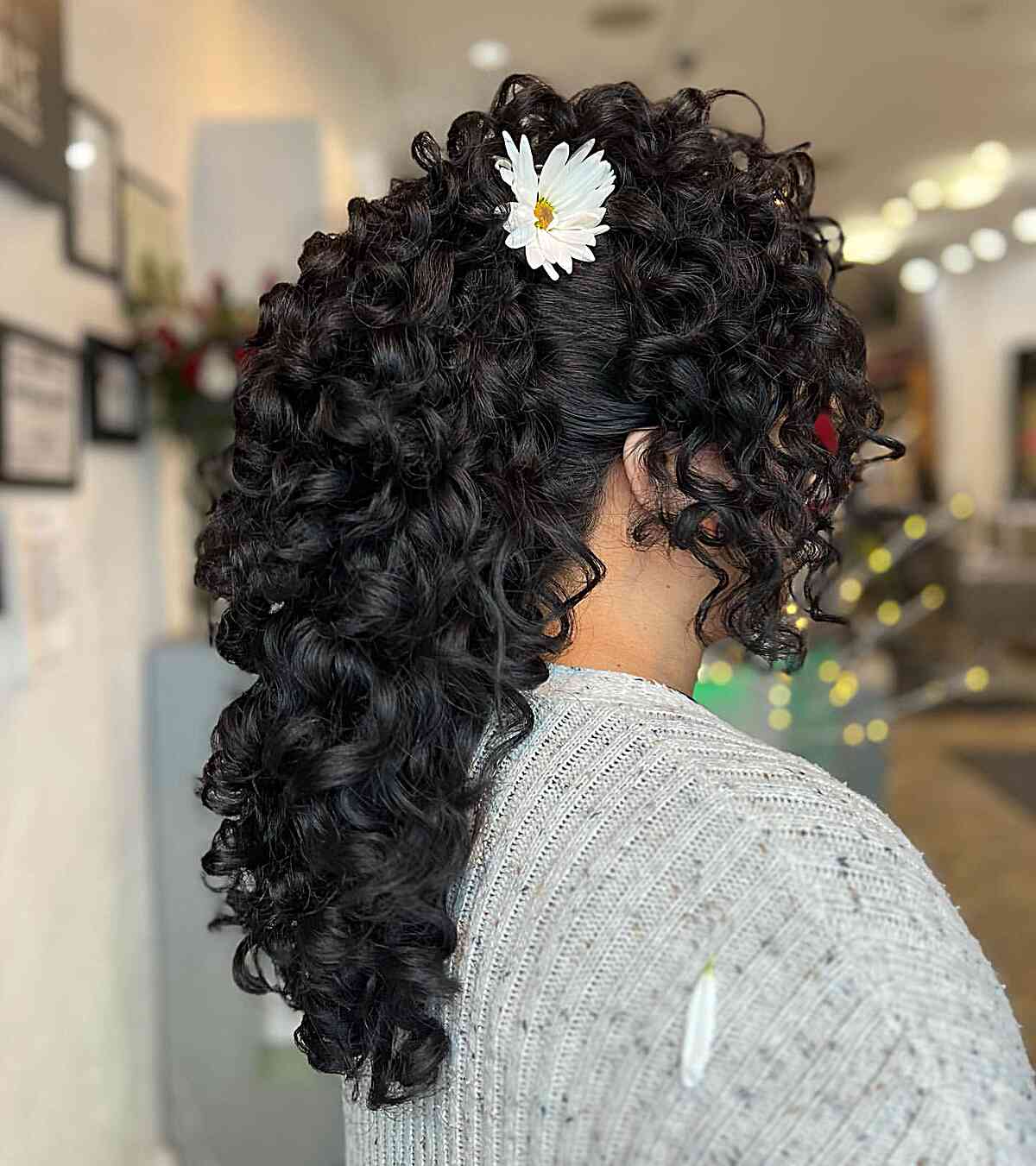 Side-Swept Hairstyle with Flower