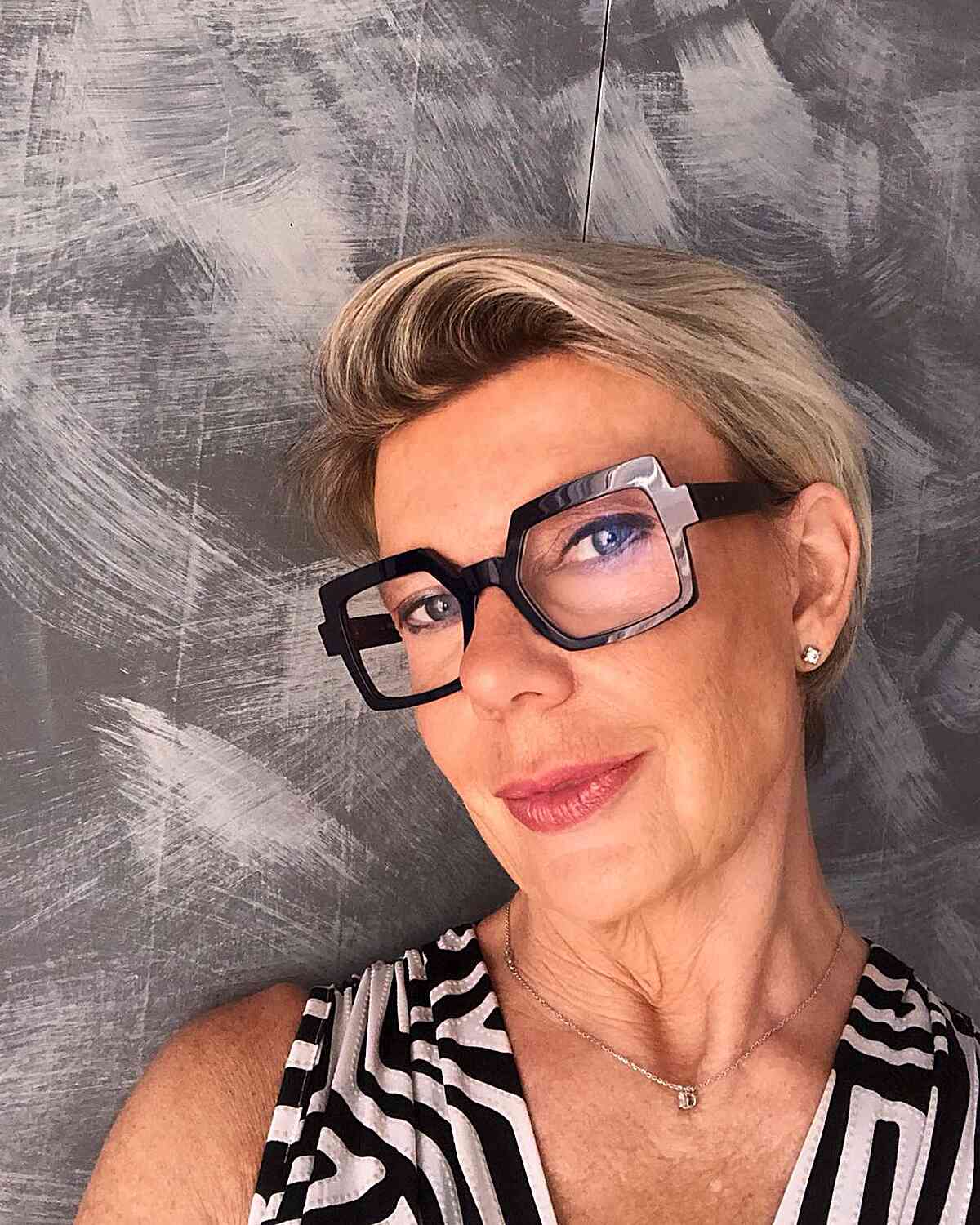 Side-Swept Long Pixie Hair for 50-year-old Women's Blonde Hair with Eyeglasses