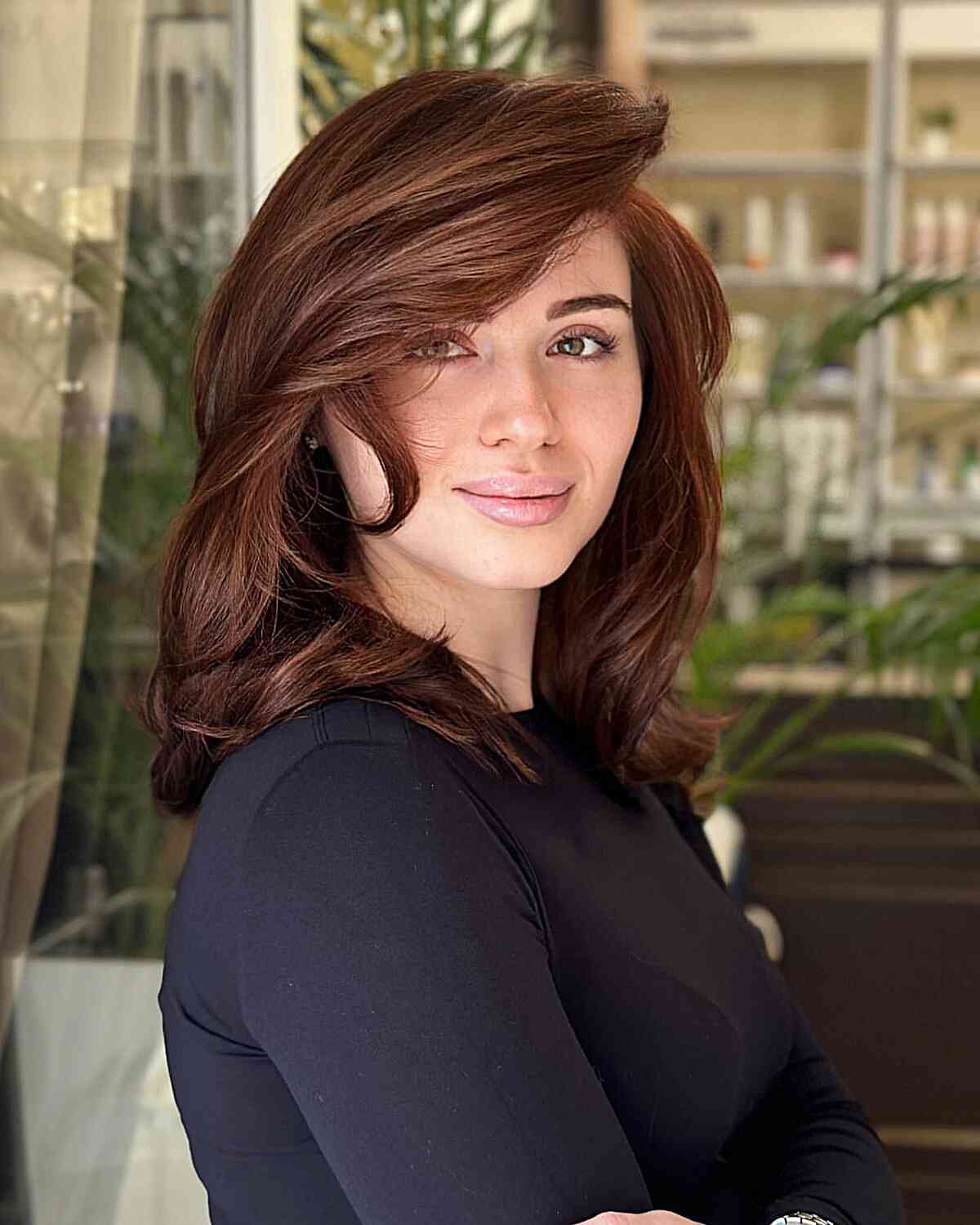 Side-Swept Medium Wavy Thick Hair with Soft Layers on Brown Locks